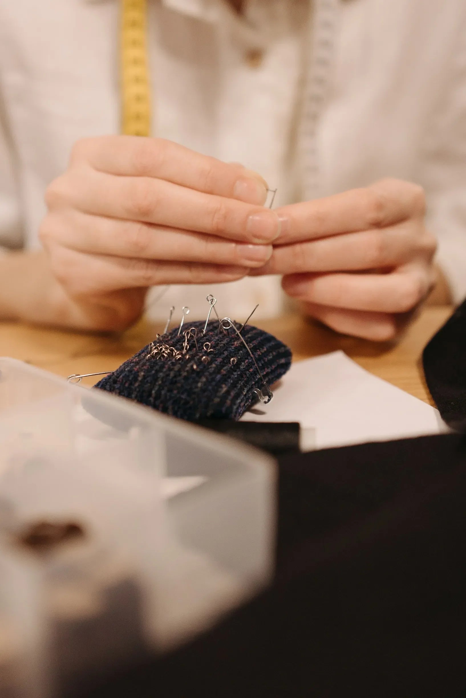How were the flat caps constructed and hand-finished for filming?